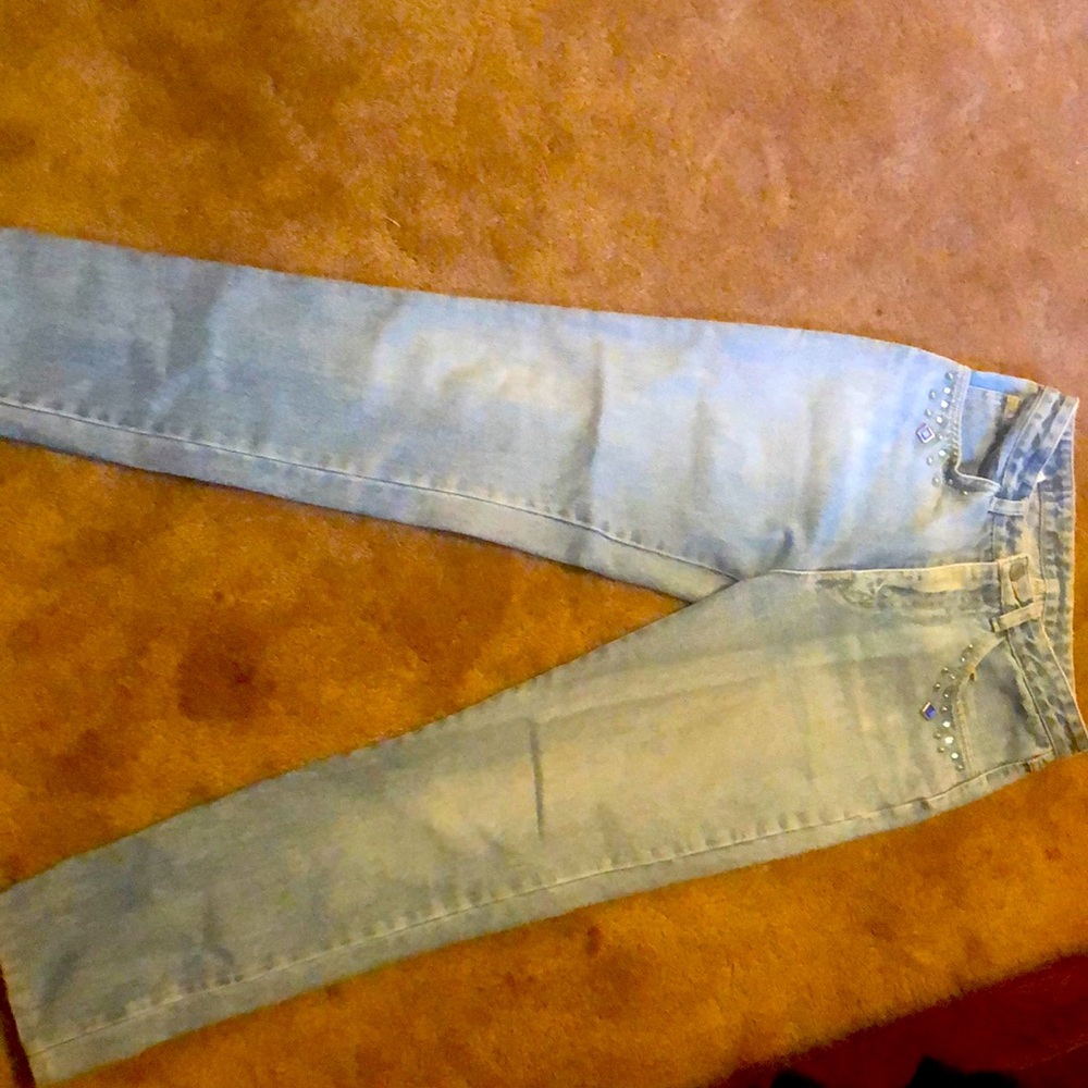Freego blue jeans with Jems on front and back no rips or scratches